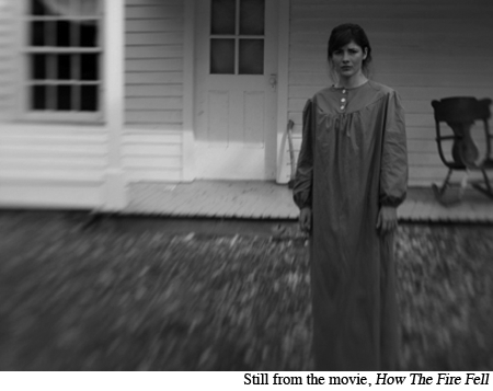 A woman in a Mother Hubbard